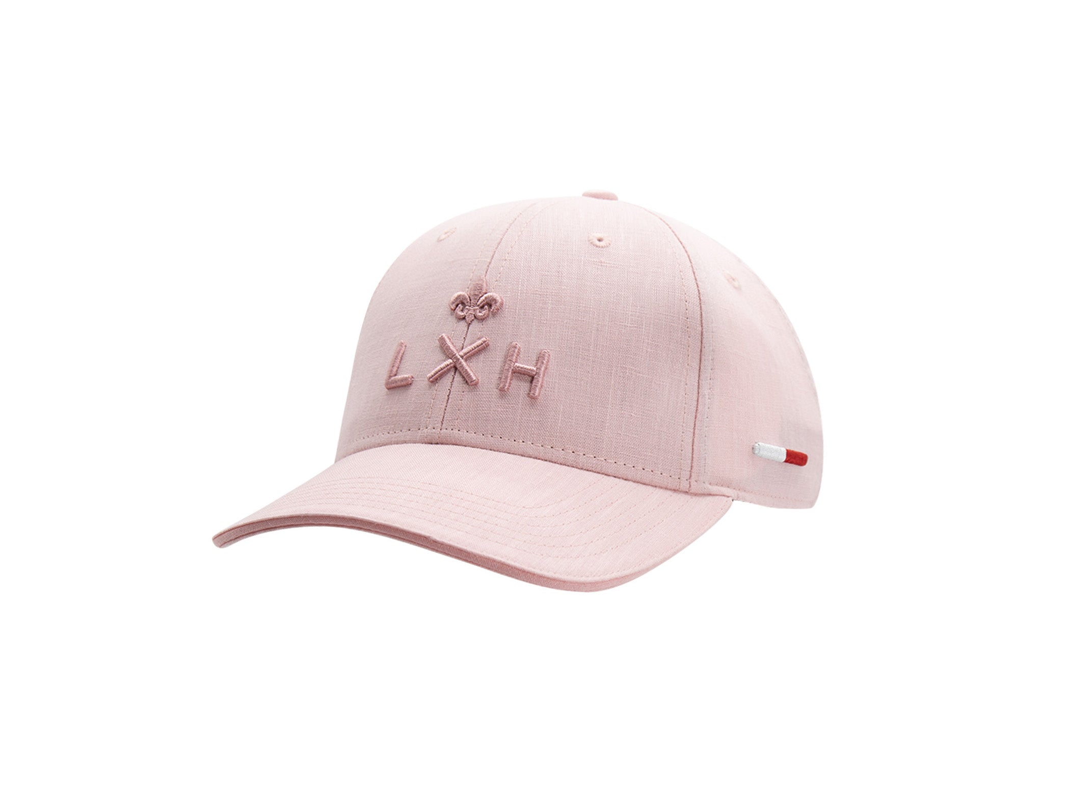 Casquette LXH x Monaco GP lin rose poudré face, logo LXH et fleur de lys brodés ton sur ton, étiquette tricolore.