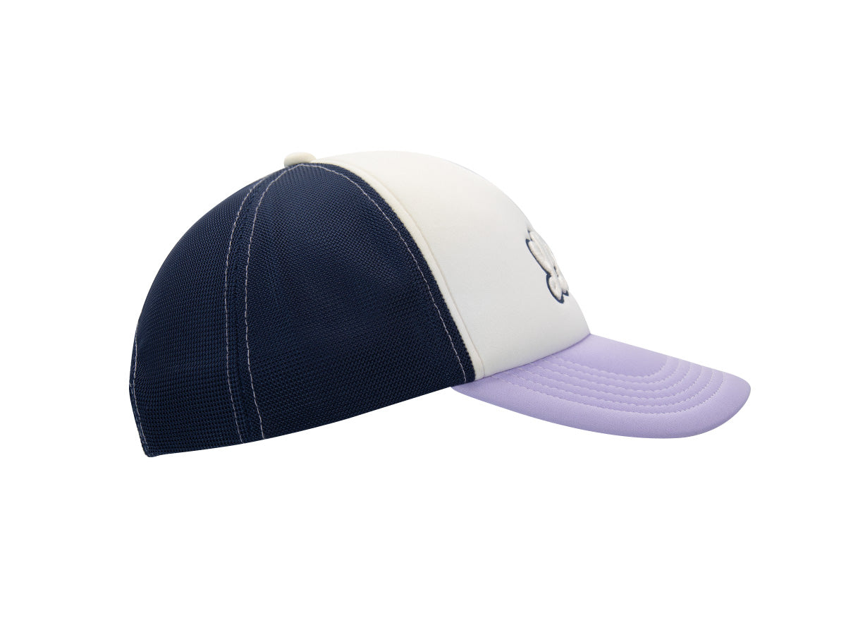 Profil droit casquette LXH « Signature » trucker, mesh marine, panneau écru écusson brodé, visière améthyste pastel.