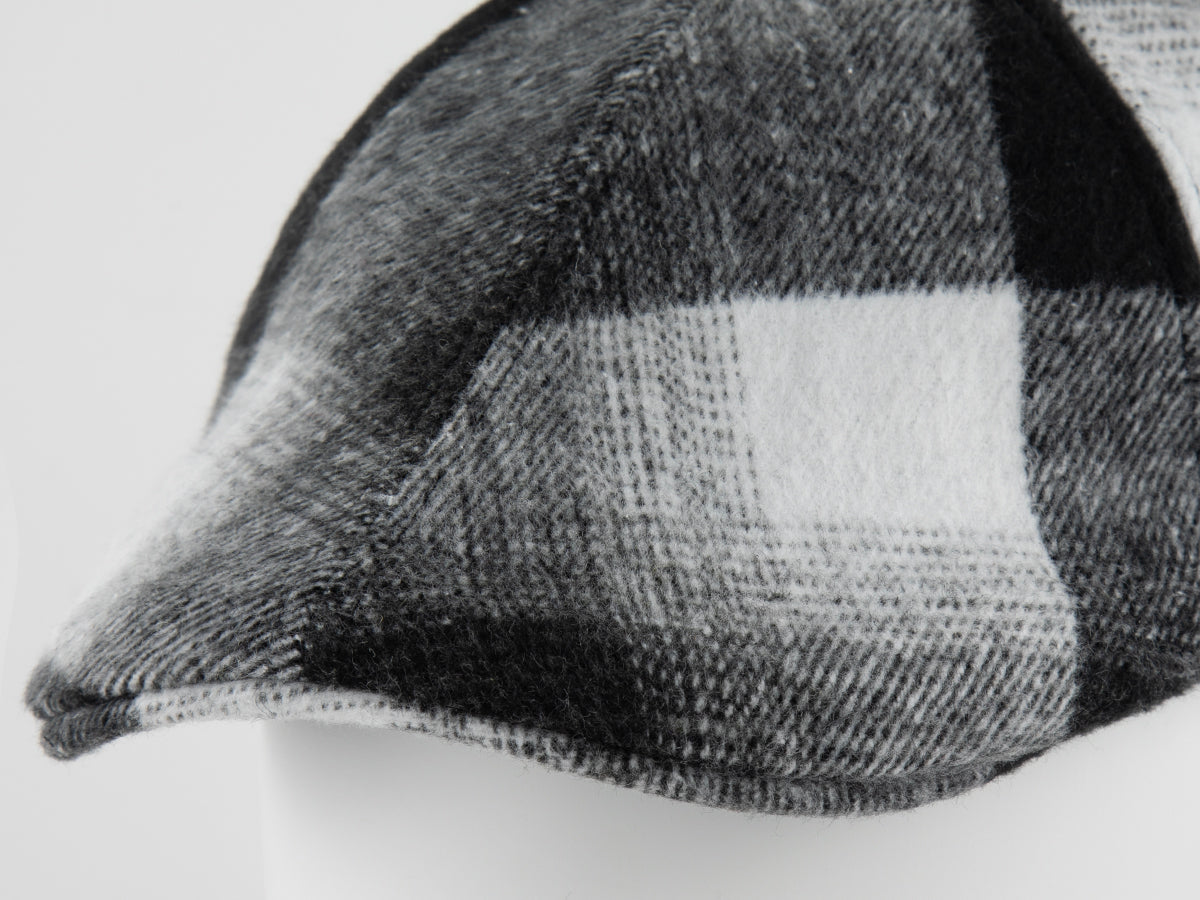 Béret tartan gris de la marque LXH avec un design en flanelle à carreaux