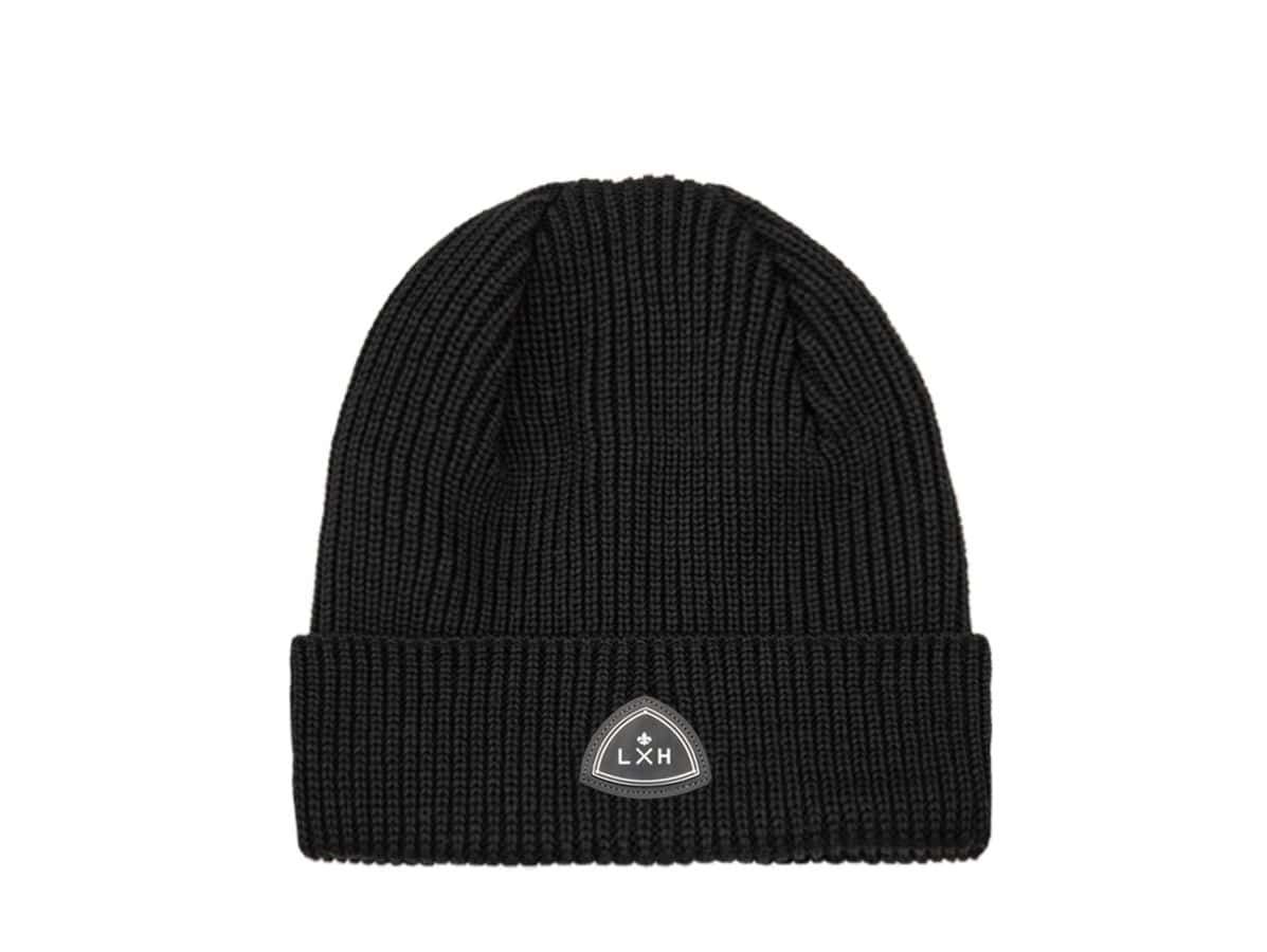 Bonnet en laine mérinos noir LXH, maille côtelée et large revers orné de l'écusson triangulaire fleur de lys.