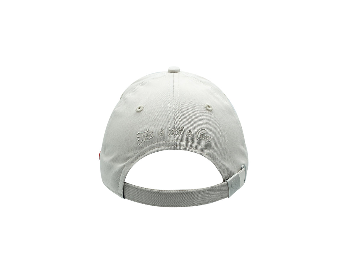 Vue arrière de la casquette coton mastic LXH avec broderie élégante et fermeture réglable