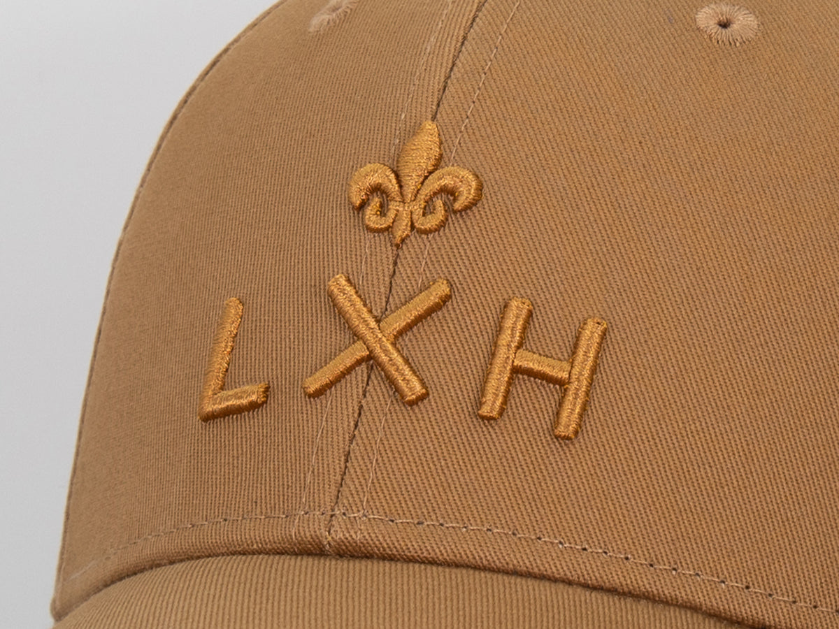 Casquette coton pain d'épice LXH avec logo brodé sur le devant pour un look tendance.