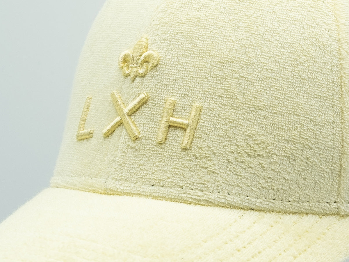 Casquette éponge jaune citron de la marque LXH avec logo brodé sur le devant