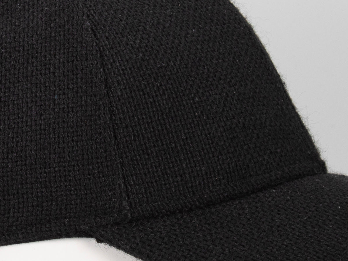 Casquette noire homme luxe de la marque LXH avec une texture élégante et moderne