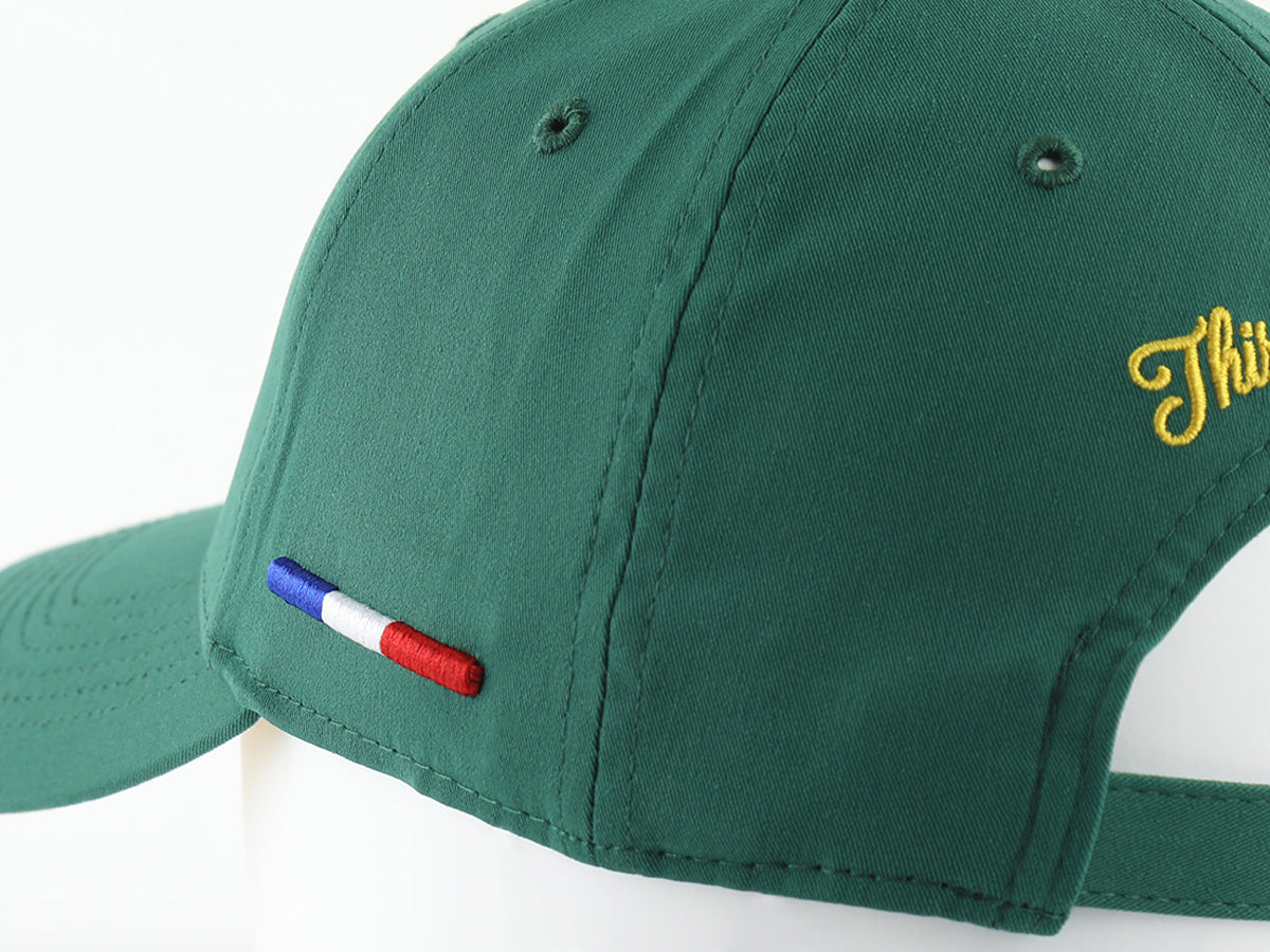 Casquette verte homme luxe avec broderie jaune et drapeau français sur l'arrière