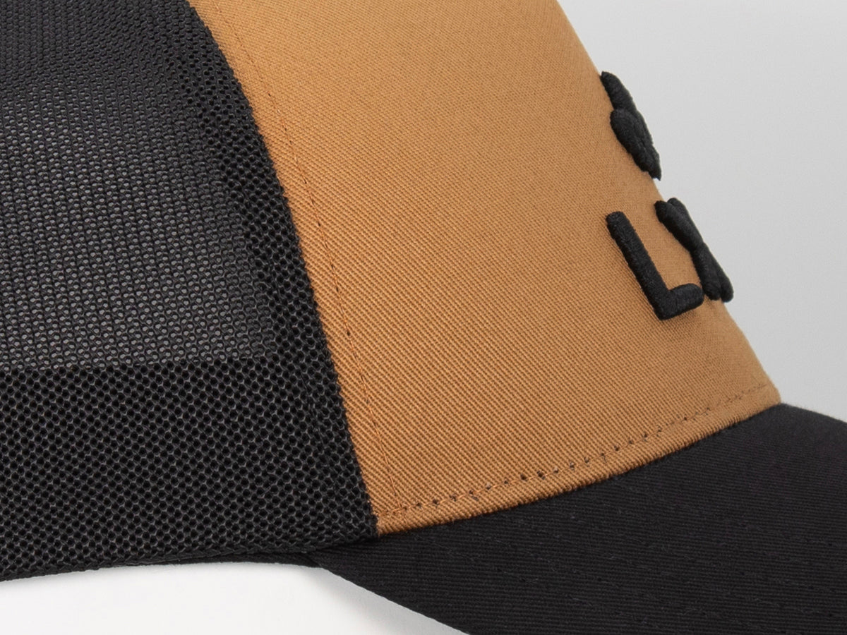 Casquette coton bi-color pain d'épice noir avec logo LXH pour un style décontracté