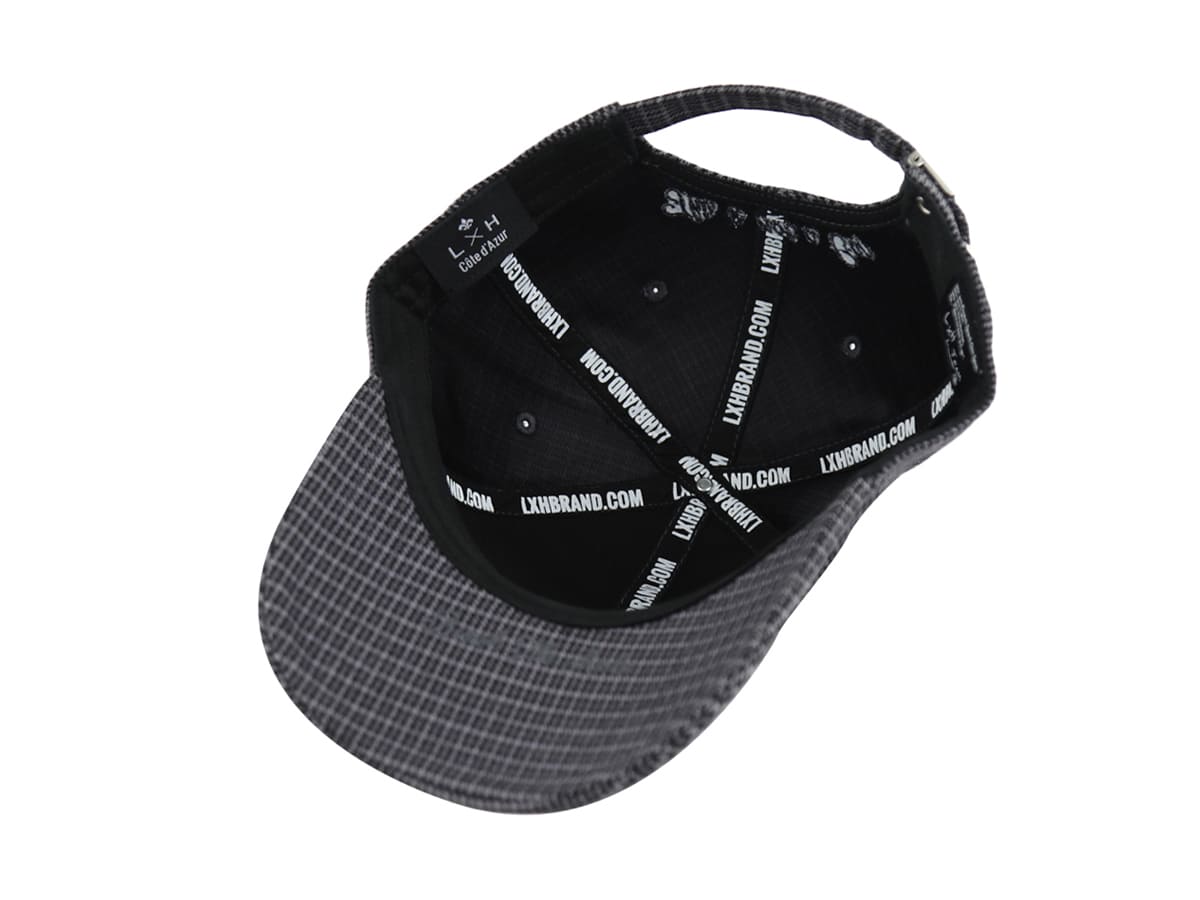 Vue intérieure de la casquette pied-de-poule homme LXH avec motif élégant en noir et gris