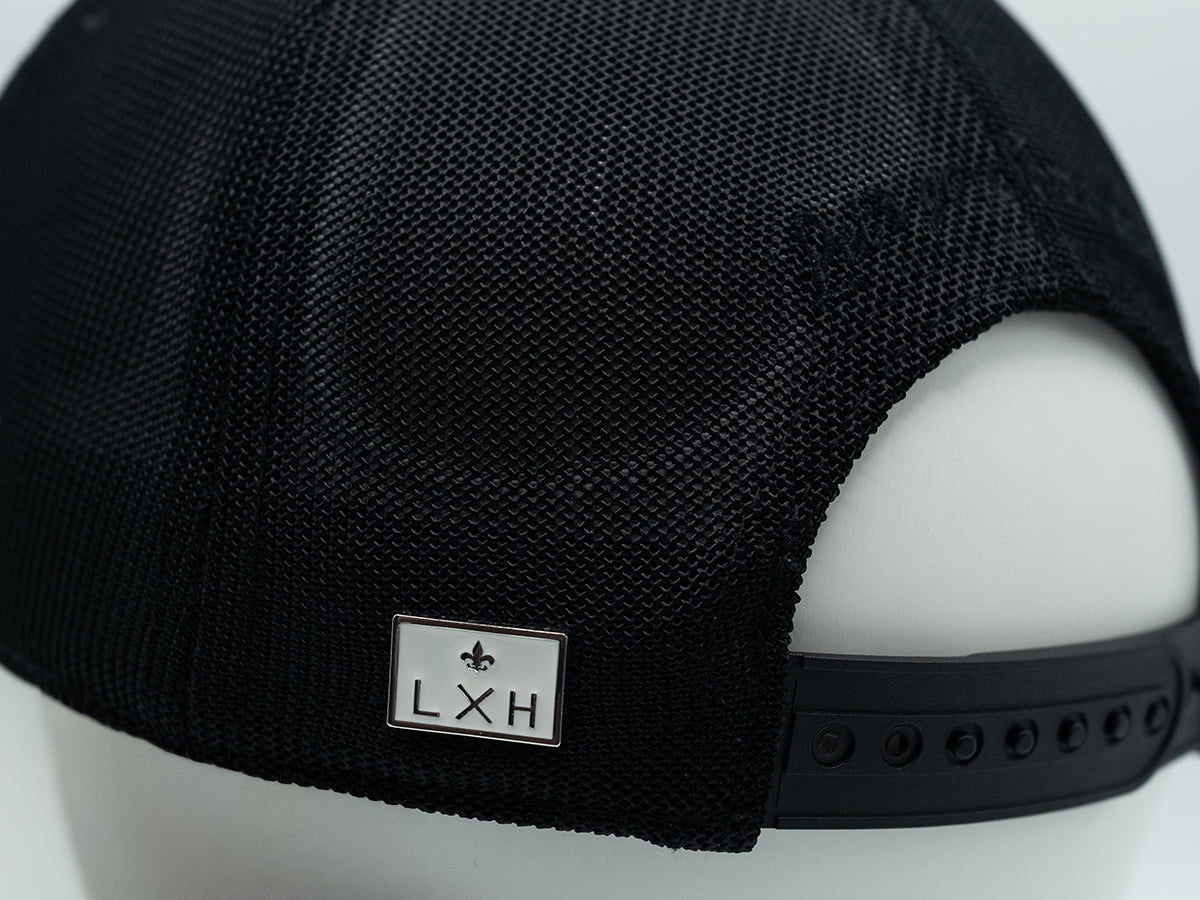 Casquette noire LXH avec fermeture réglable Ton sur Ton pour un style sobre et élégant