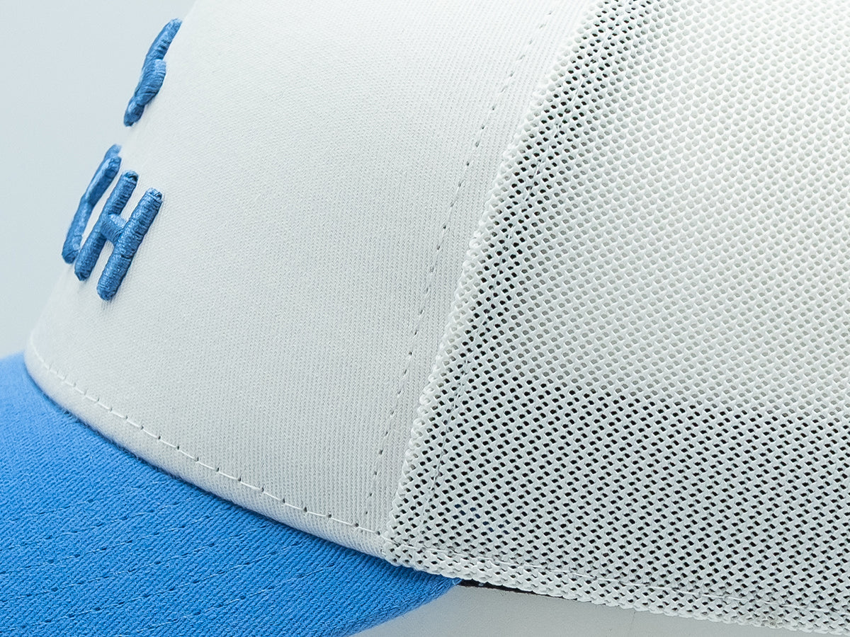 Casquette LXH en coton bicolor avec visière bleue et panneau arrière en mesh