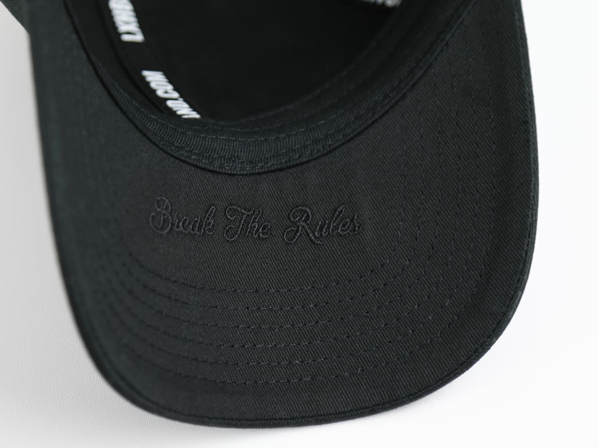 Casquette LXH en coton noir avec broderie 'Break The Rules' sur la visière