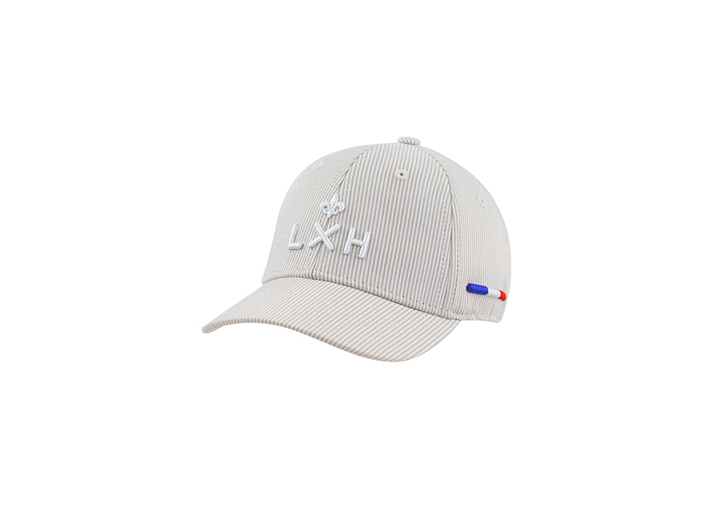 Casquette bébé rayée beige blanc de la marque LXH avec broderie sur le devant