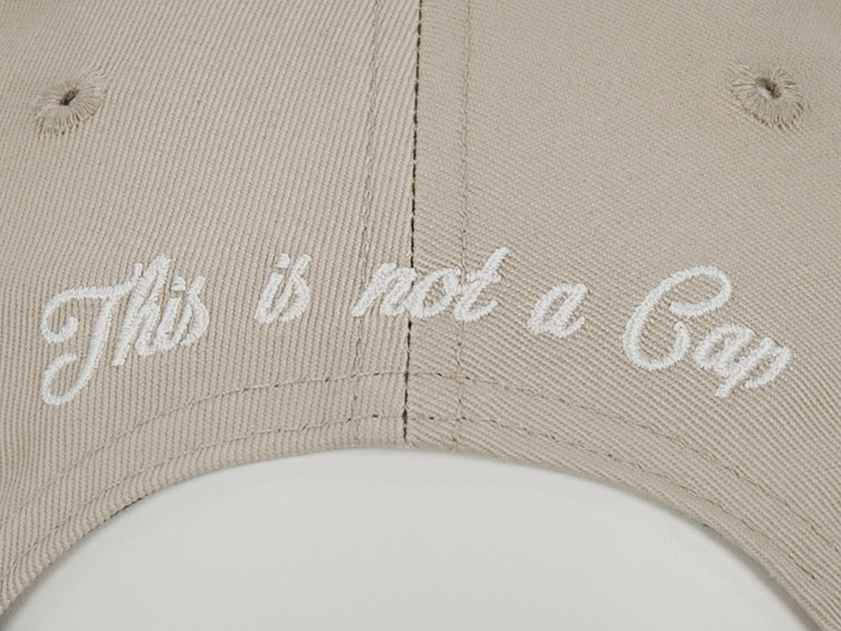 Casquette coton beige homme avec broderie 'This is not a Cap' pour un style décontracté