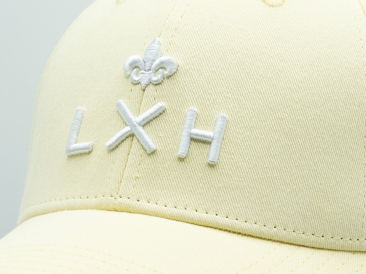 Casquette coton jaune citron LXH avec logo brodé en blanc pour une allure moderne