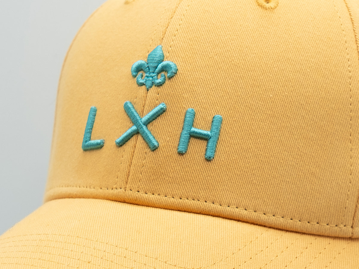 Casquette coton jaune premium LXH avec broderie en bleu clair sur le devant