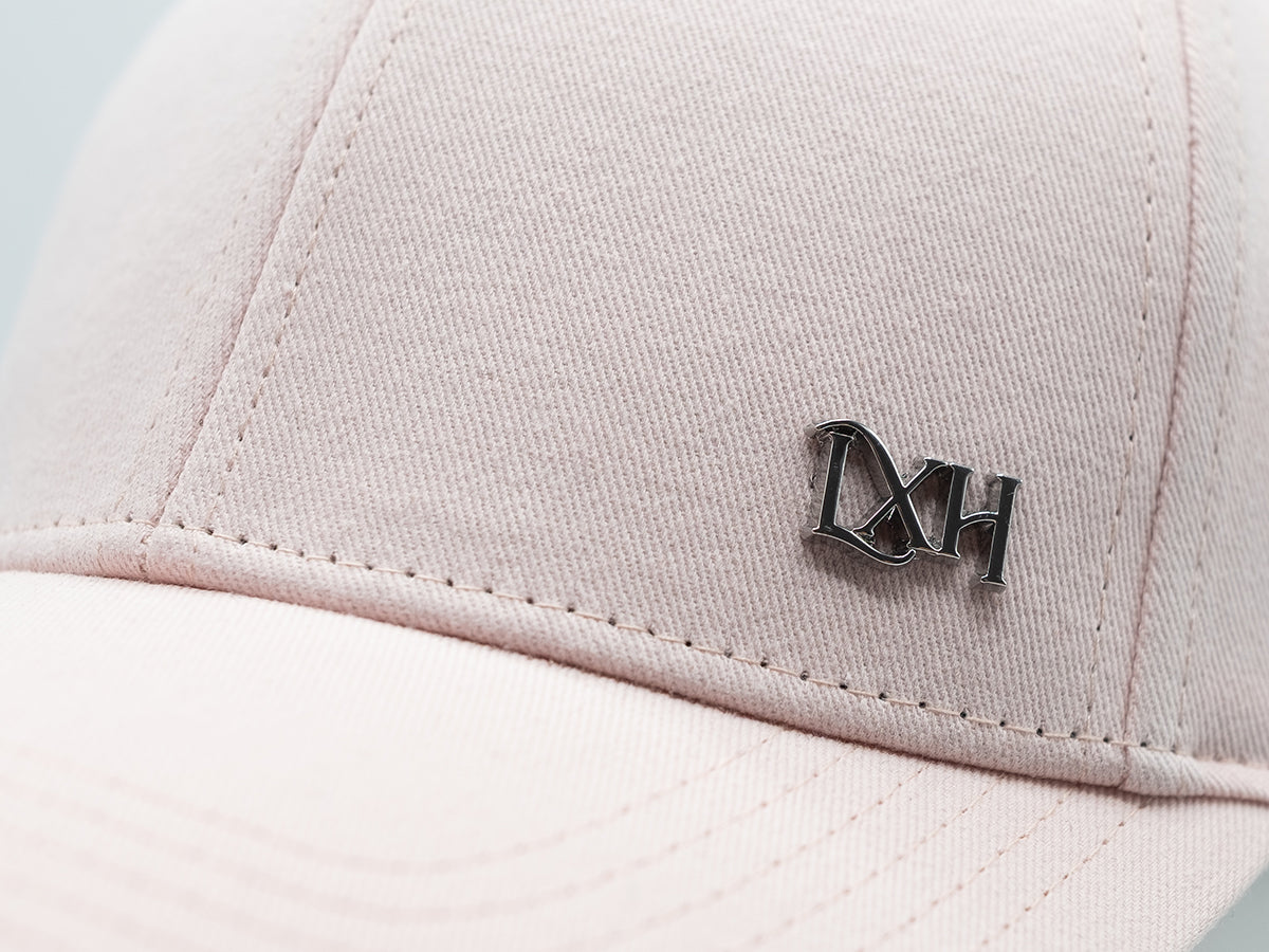 Casquette coton rose poudré LXH avec logo métallique sur le devant