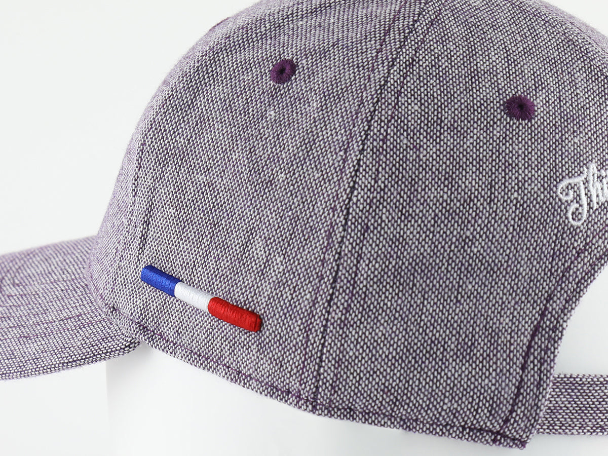 Détails de la casquette laine violette LXH avec broderie et patch français sur le côté