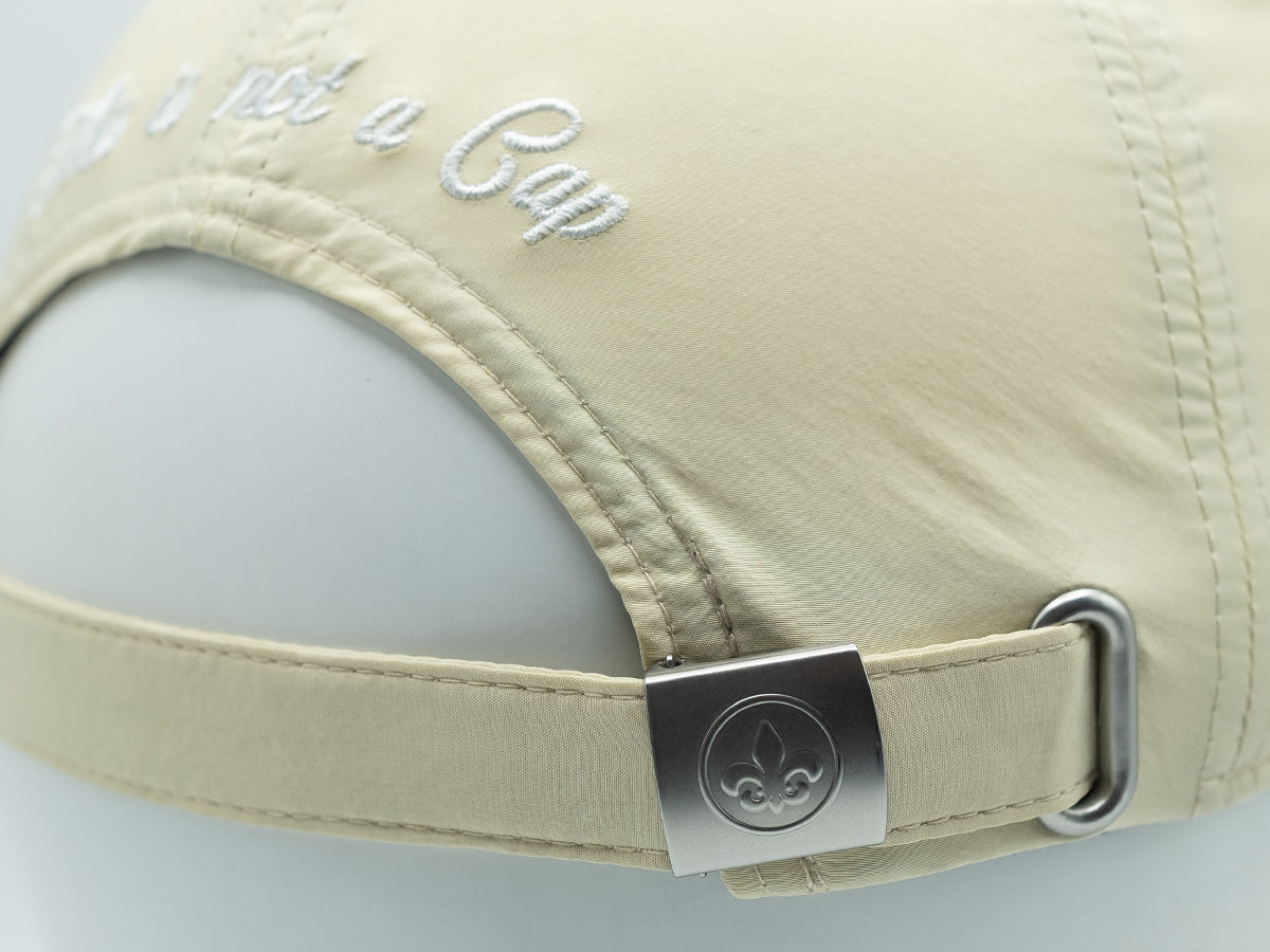 Casquette nylon beige homme avec broderie et arrière réglable pour un style décontracté