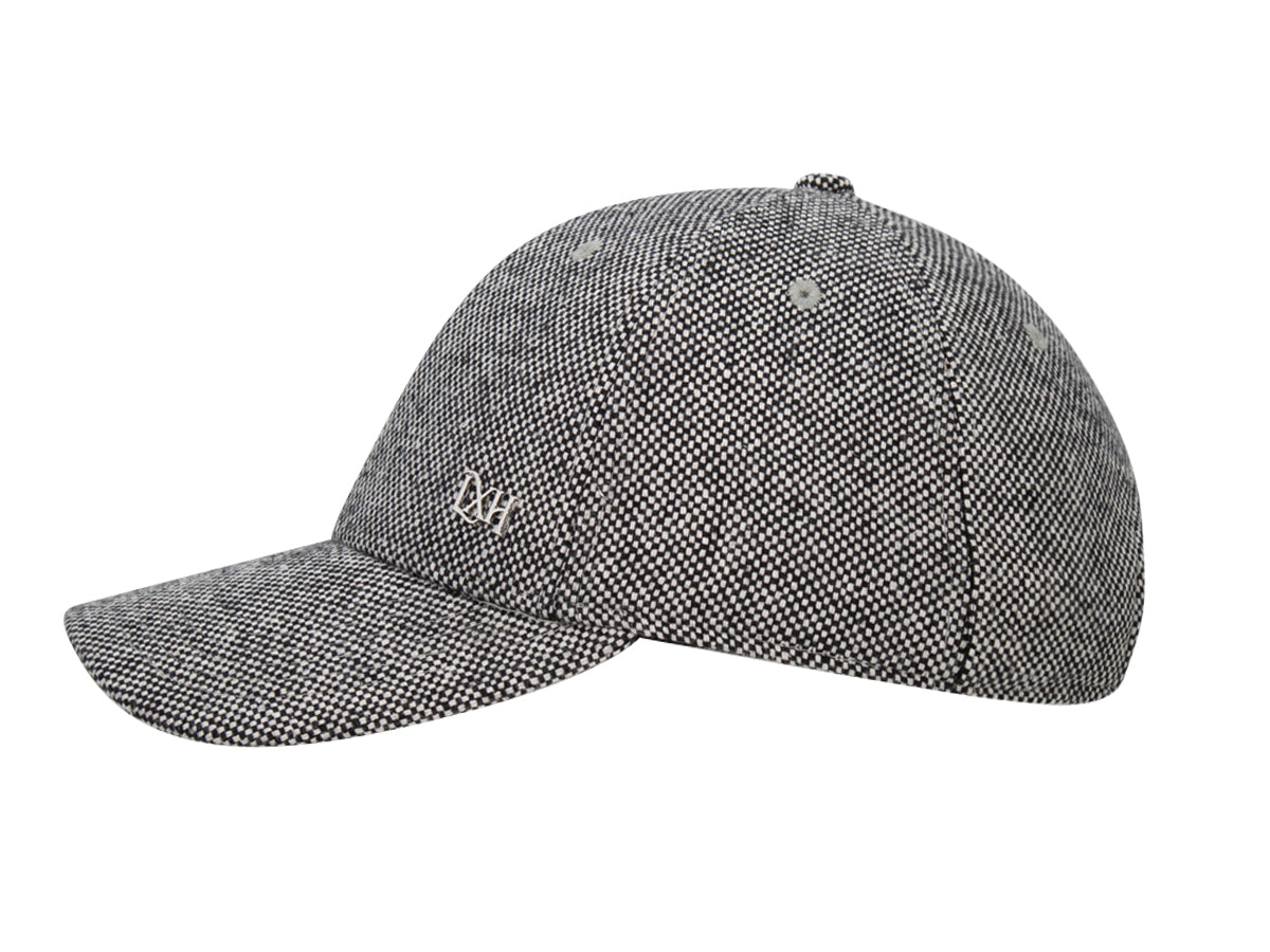 Casquette prestige gros caviar noir de LXH avec design élégant et texturé