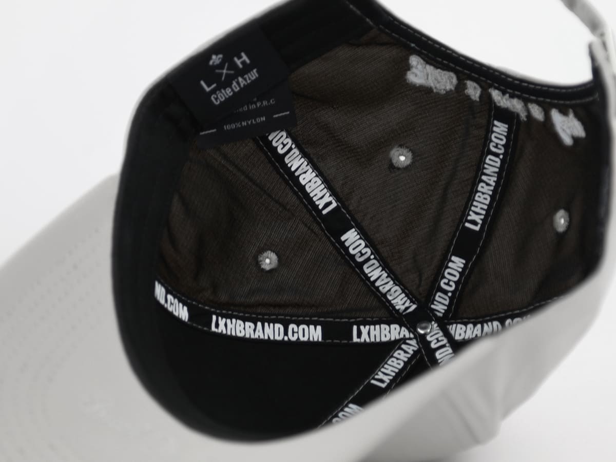 Macro étiquette intérieure noire LXH Côte d Azur 100% Nylon cousue sur la doublure « Héritage » gris clair