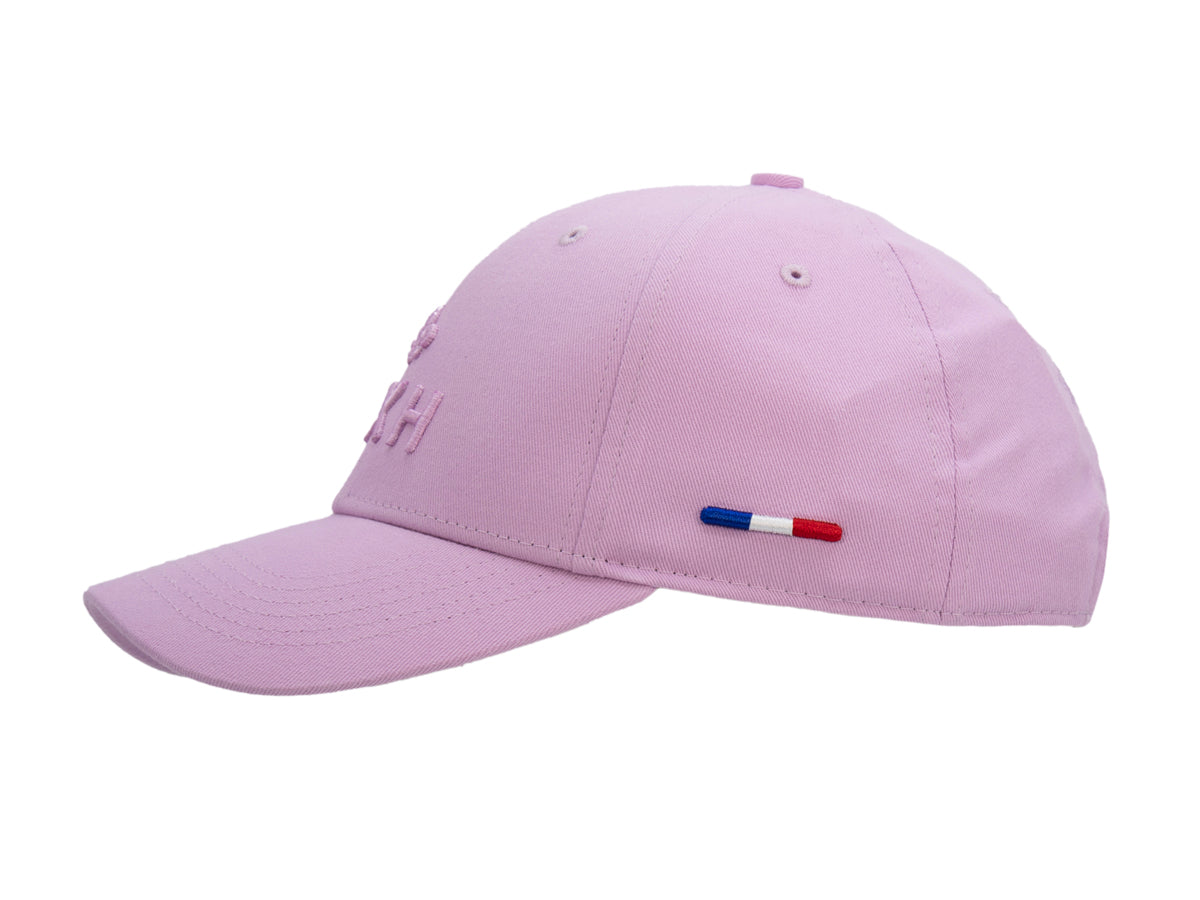 Casquette Héritage rose orchidée vue de trois quarts avant droit, drapeau tricolore brodé sur le panneau.