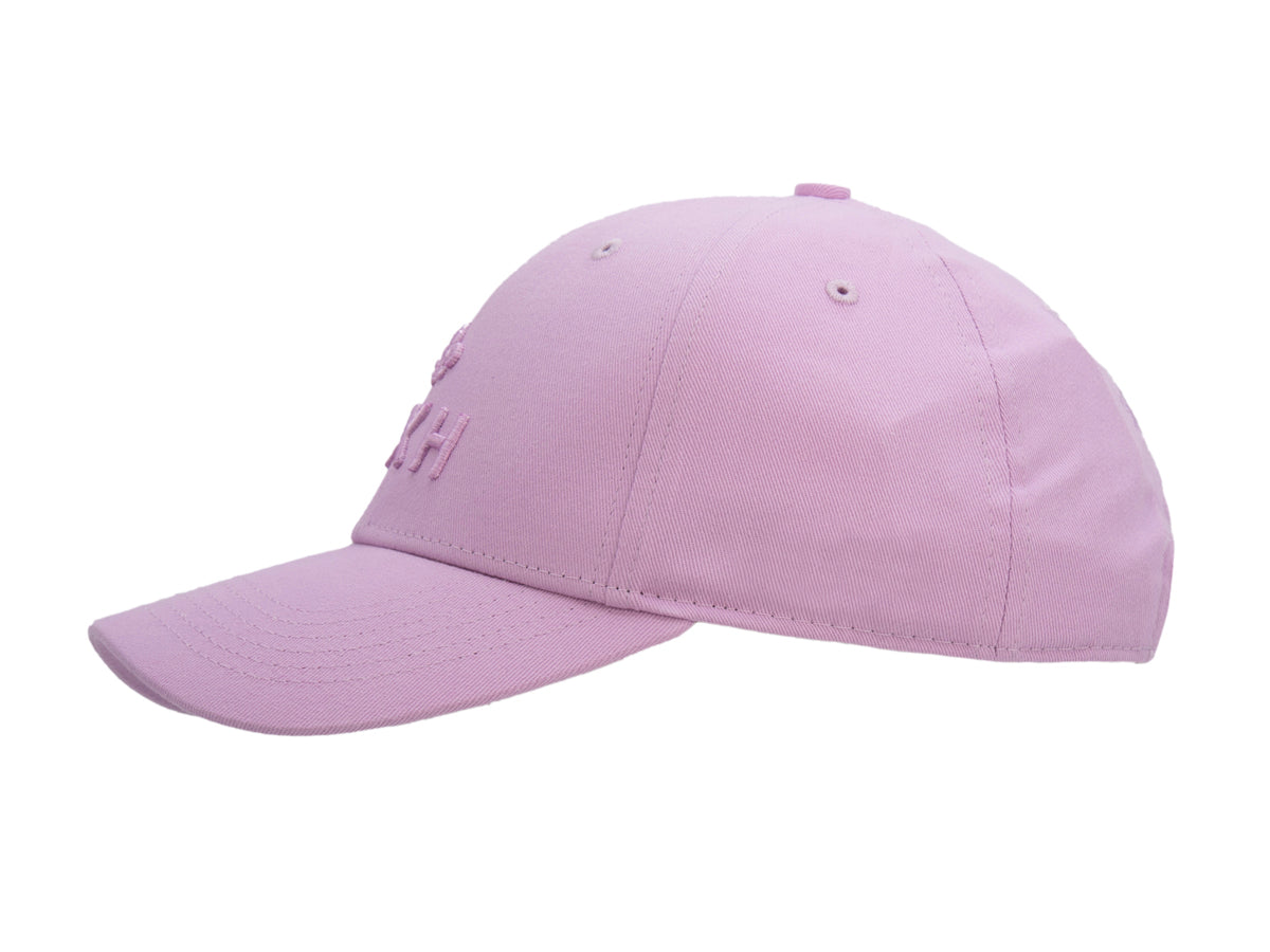 Profil gauche de la casquette Héritage rose orchidée sans ligne, panneau uni et visière incurvée.