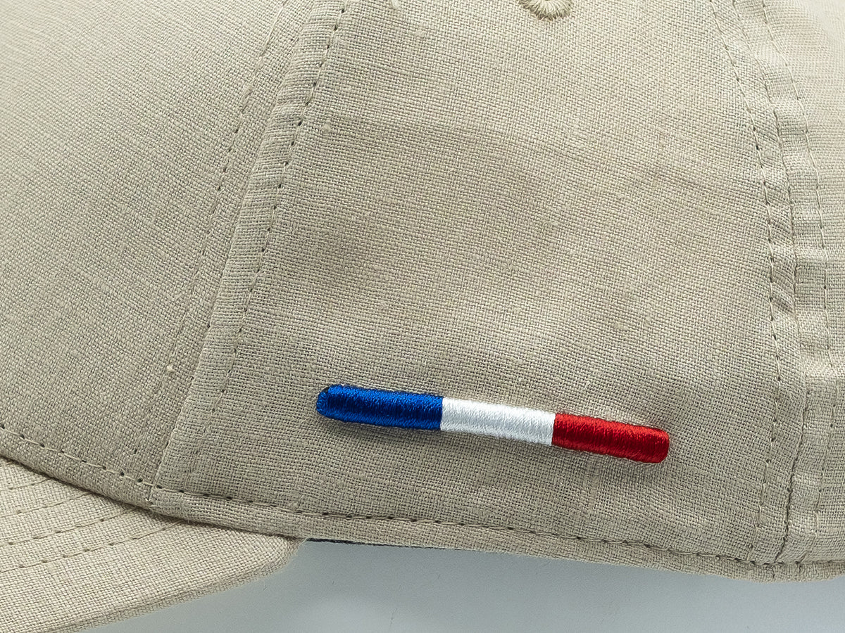 Casquette LXH en lin beige avec broderie tricolore sur le côté pour un style décontracté