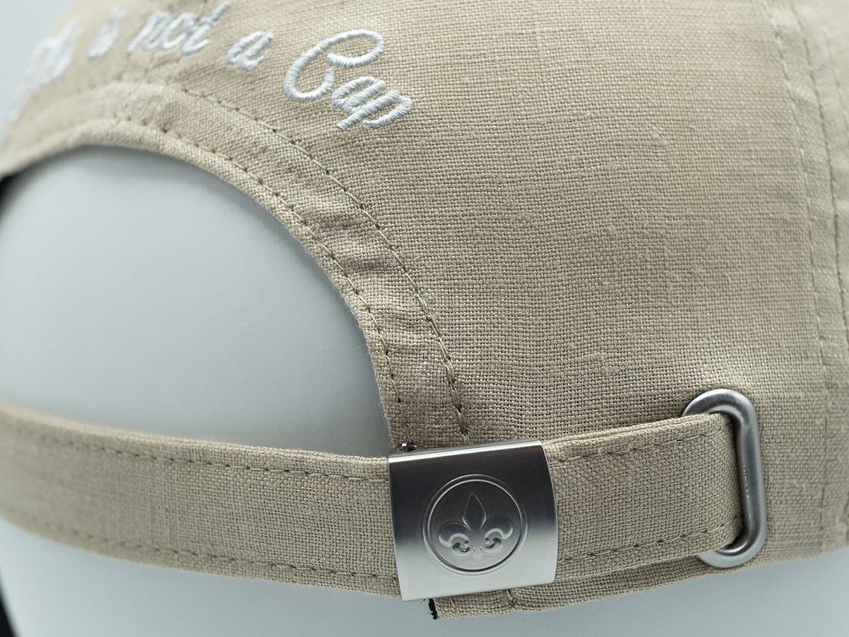 Casquette LXH en lin beige avec broderie sur le devant et fermeture réglable à l'arrière
