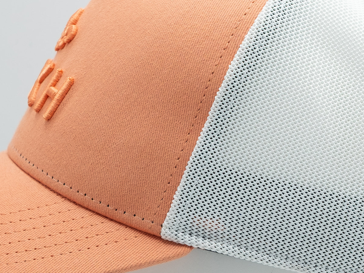 Casquette LXH orange avec filet blanc détail Ton sur Ton logo brodé sur le devant