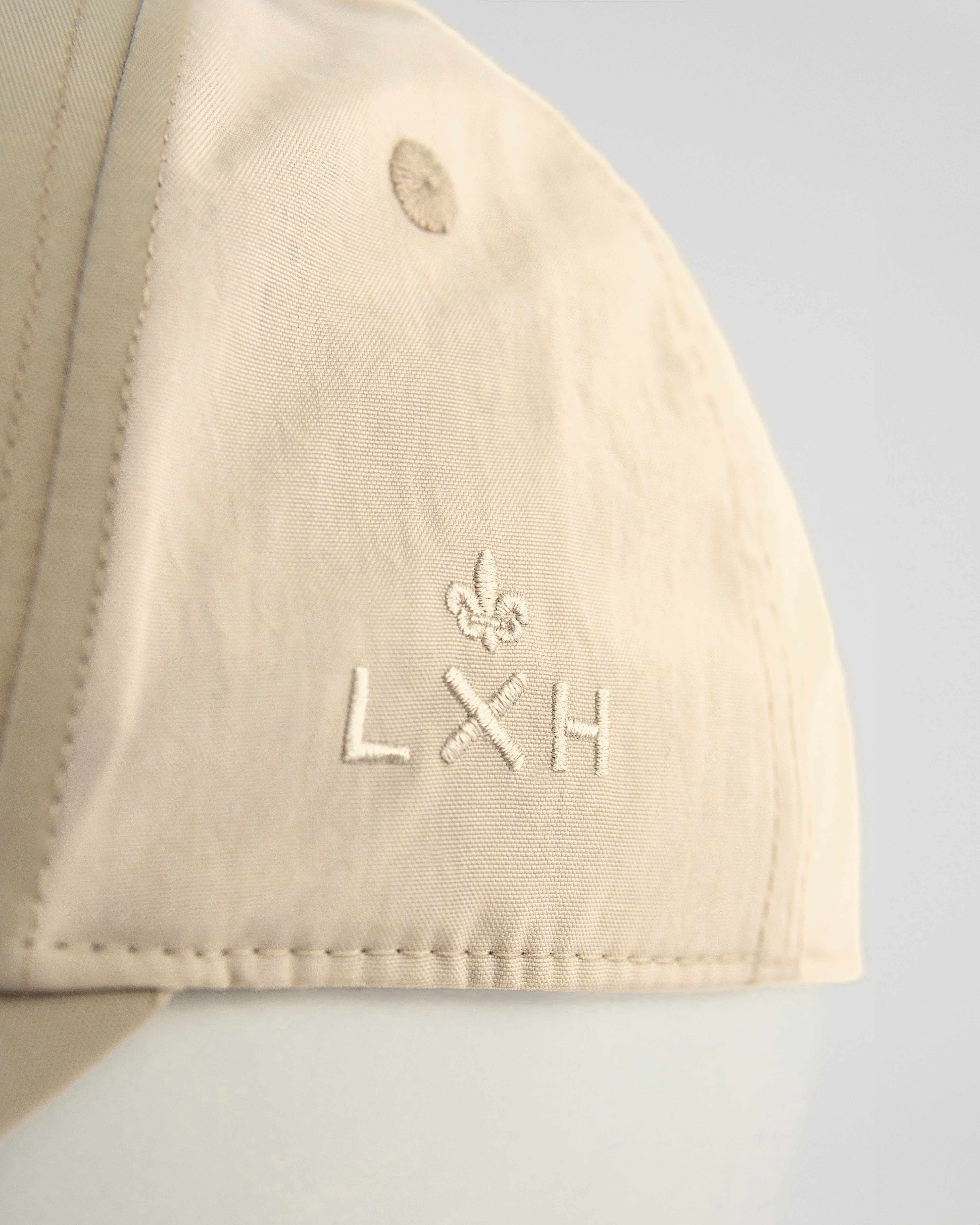 Casquette LXH beige en nylon avec broderie élégante sur le devant